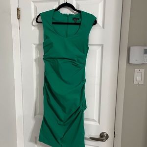 A slimming green body con dress size medium, le chateau